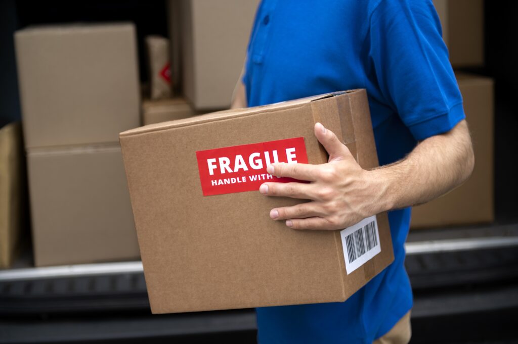 Warehouse handling and storage of fragile equipment under controlled conditions